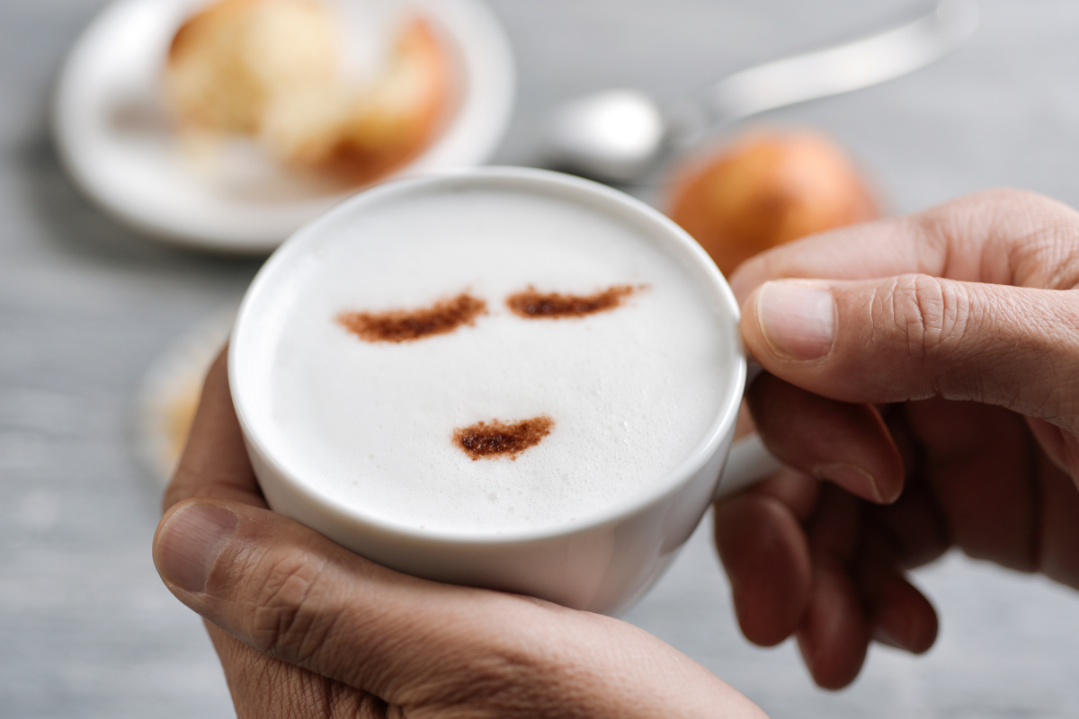 a relaxed face in a cappuccino